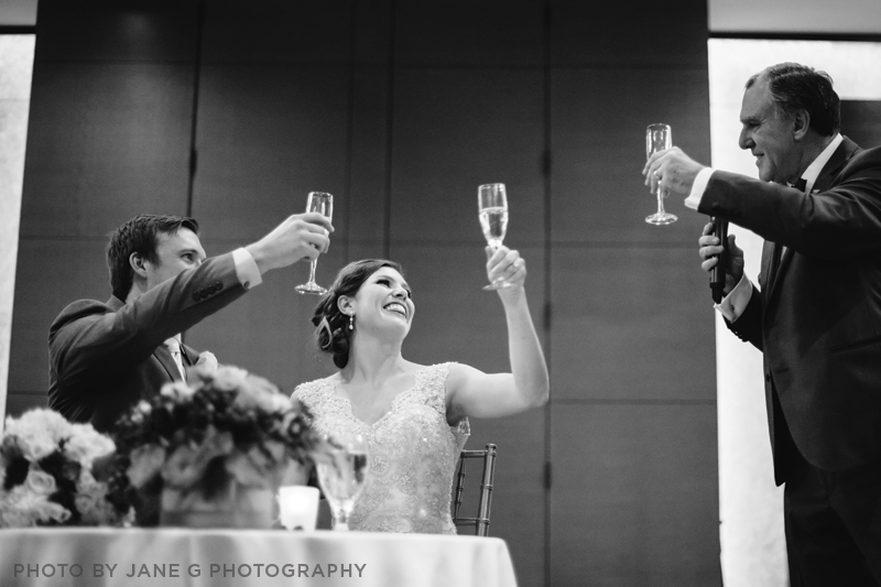 A Couple toasting JaneGPhotography