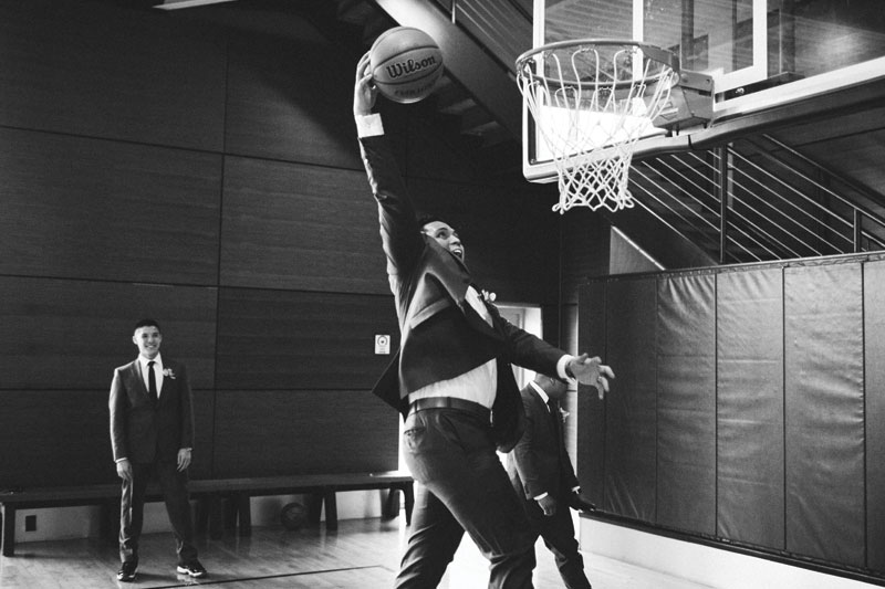 Groom playing basketball