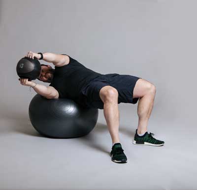 Ball Core Rotation Exercise Simple Strength - Reflections Magazine | Bellevue Club